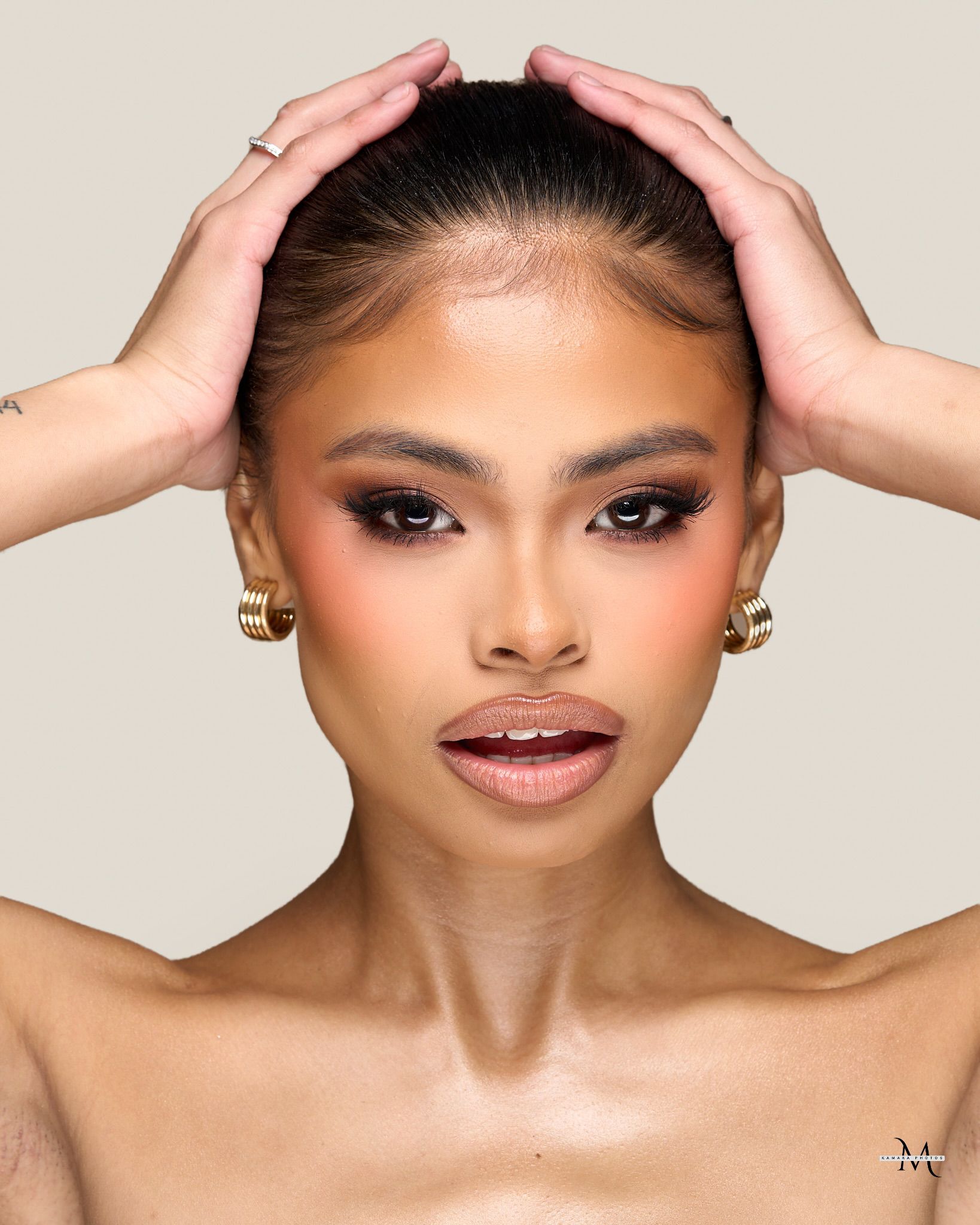 Studio beauty portrait with sculpted glam