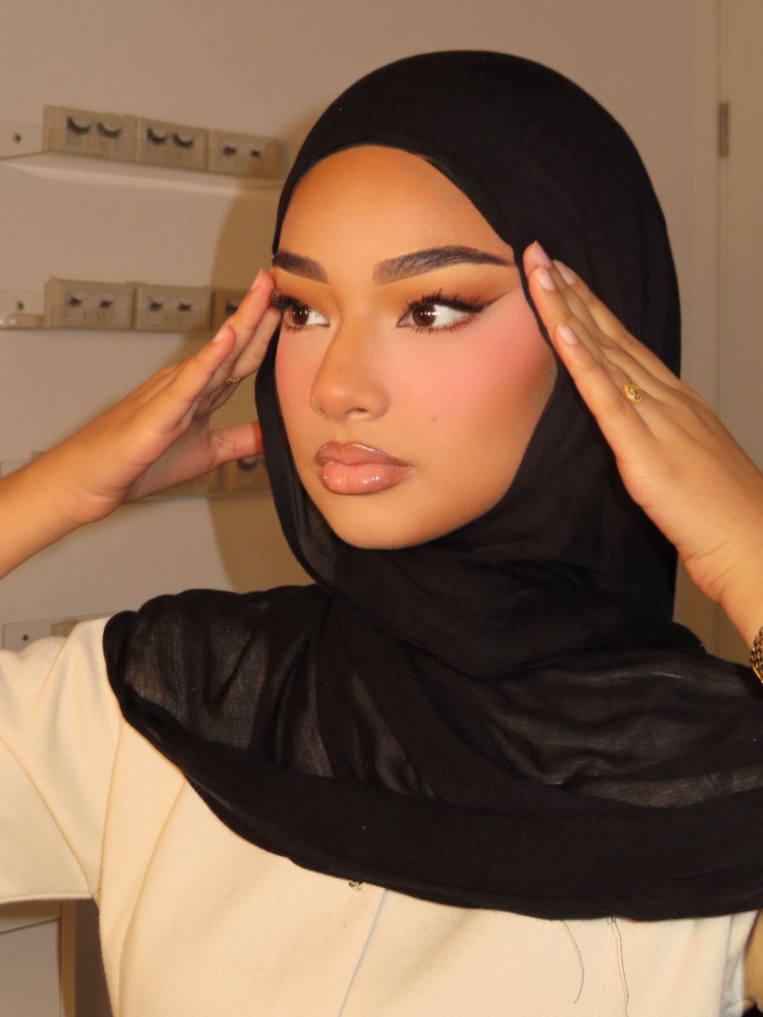 Glowing soft glam makeup in warm neutral tones